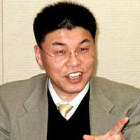 情報システム部情報システム第二課長 冨永 光則氏